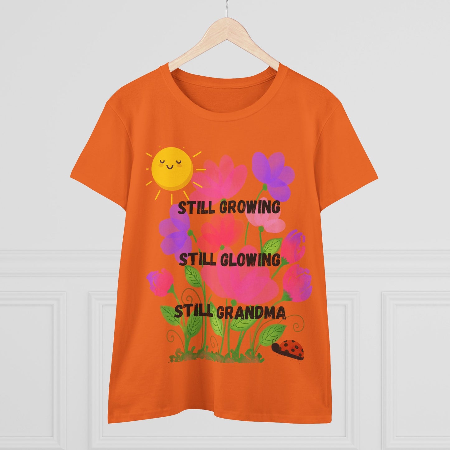 Floral Women's T-Shirt - Still Growing, Still Glowing, Grandma Gift, Mother's Day Tee, Spring Celebration Shirt, Gardening Top, Family [...]